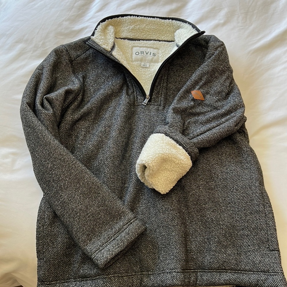 Lightly worn Orvis, lined pull over